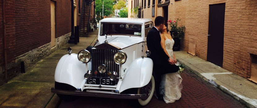 Couple on Touring Rolls Royce 1937